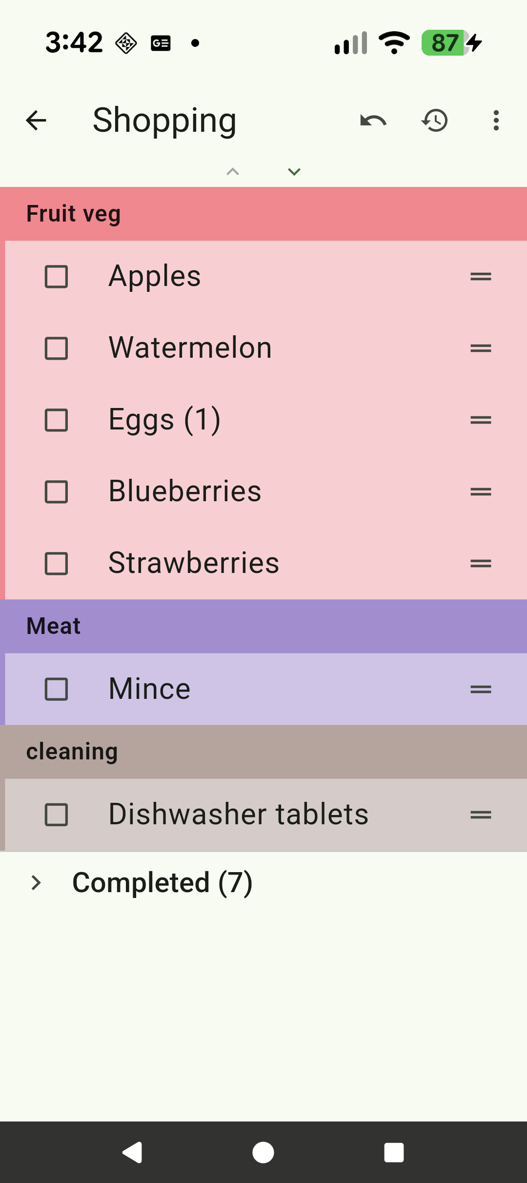 A shopping list with items sorted into colour-coded groups